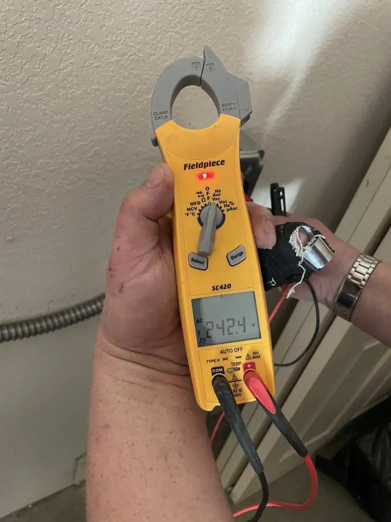 Voltage testing with clamp meter during Electrical Installation Services in Surfside Beach